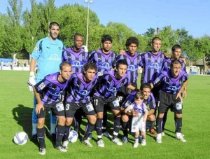 Marcos, segundo abajo por la izquierda, en el once inicial. 