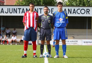 Flaquer Rey con los capitanes del partido